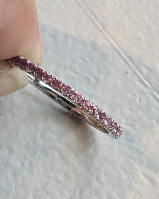 18kt white gold eternity band set with pale red rubies (1)