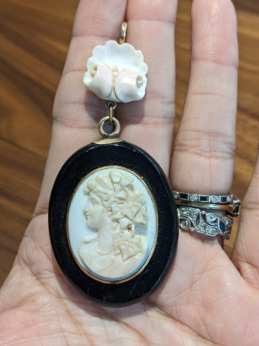 Coral cameo locket with carved shell top