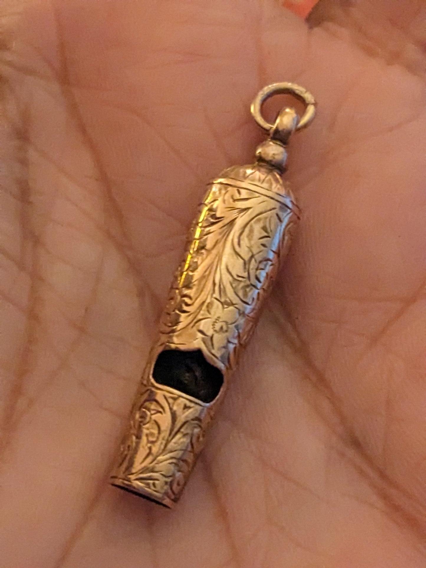 Engraved English gold whistle