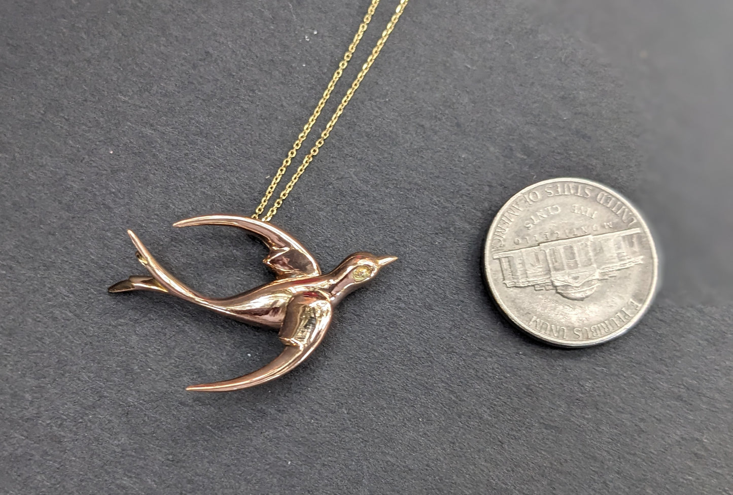 18k Gold Swallow Pendant on 14k gold Chain