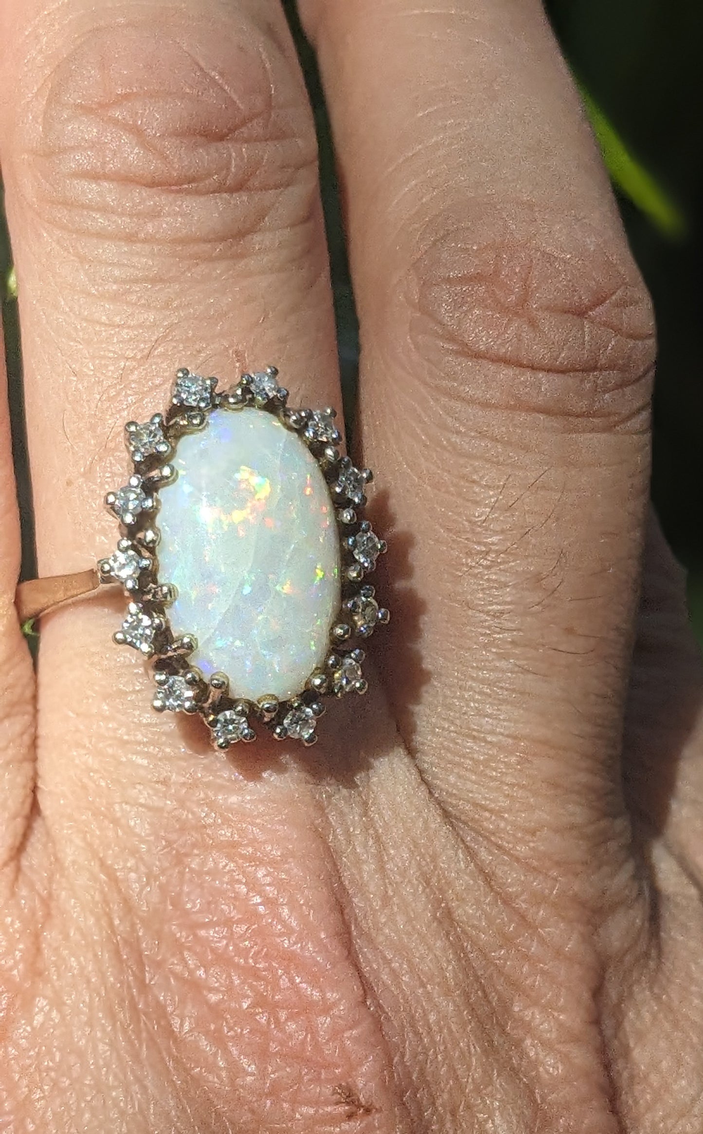 large 14k ring, opal with diamond halo