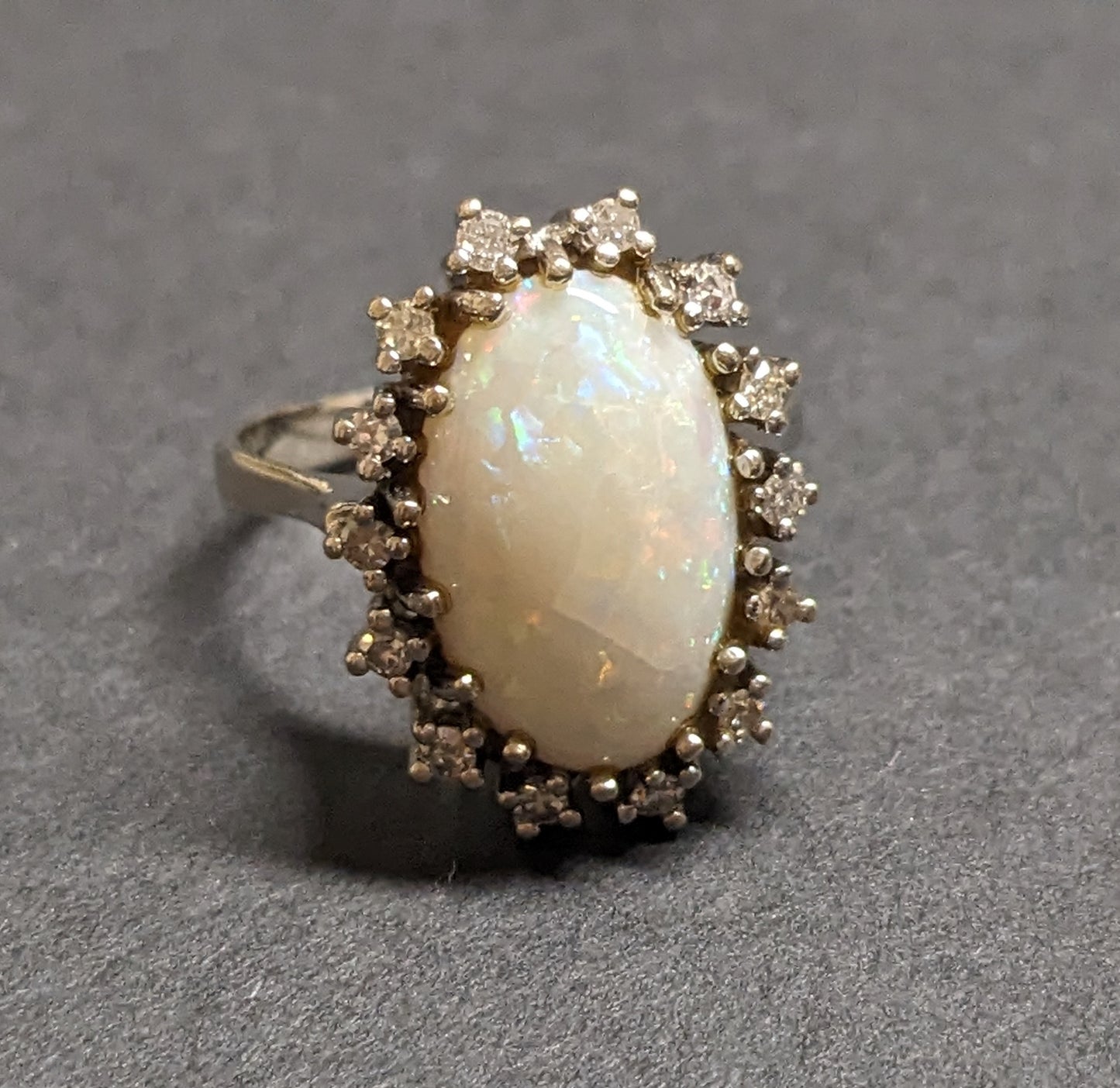 large 14k ring, opal with diamond halo