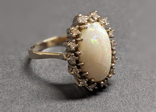 large 14k ring, opal with diamond halo