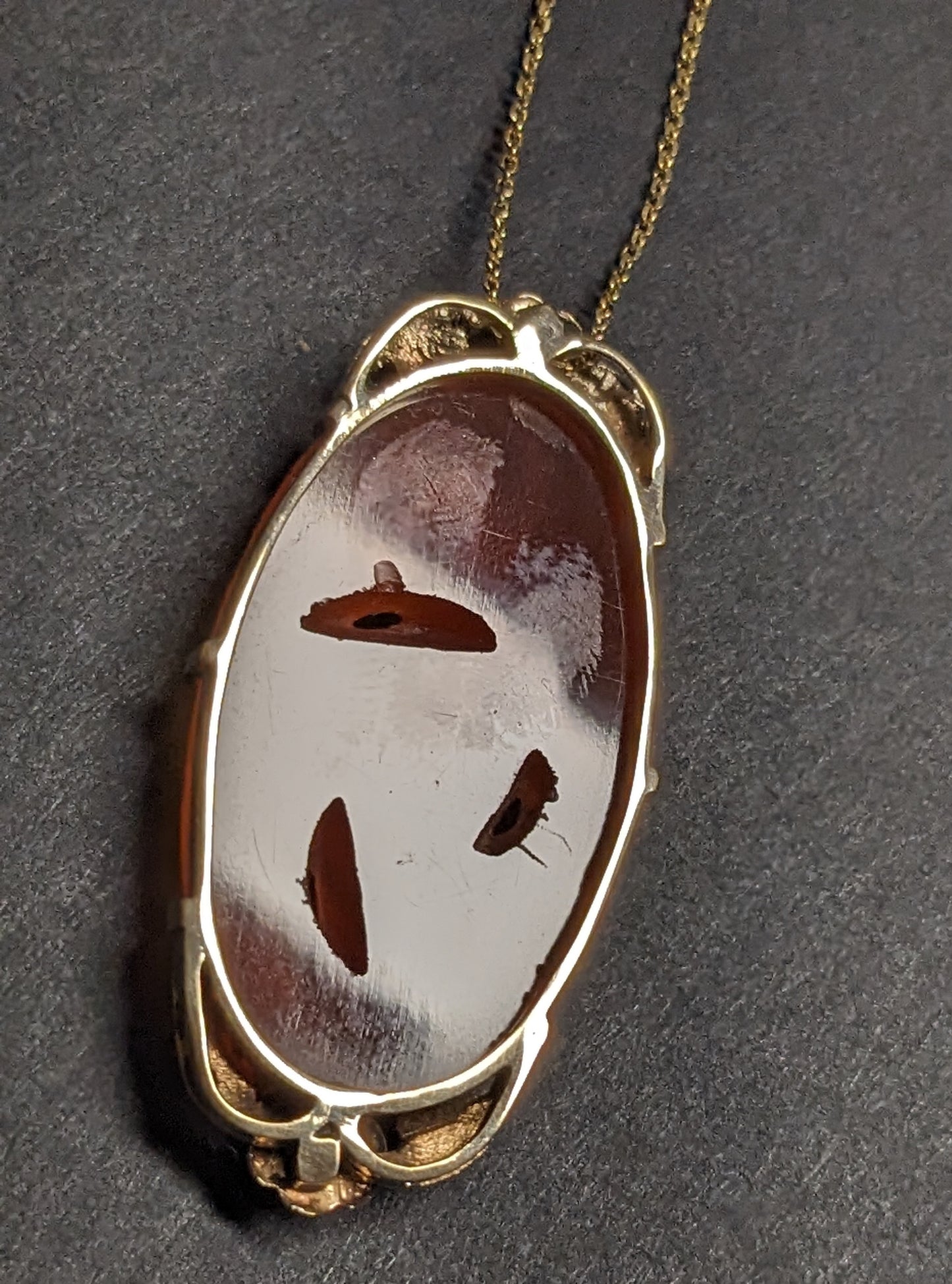 large carved carnelian pendant and chain