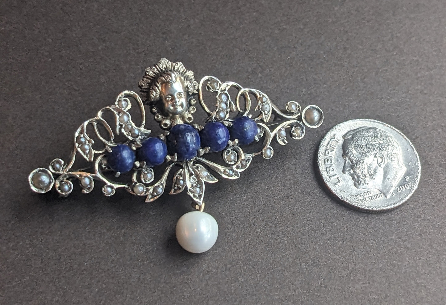 Sterling & gold Putti brooch with lapis and pearls