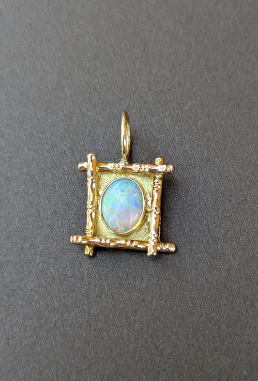 OPAL PENDANT IN 14K GOLD FRAME