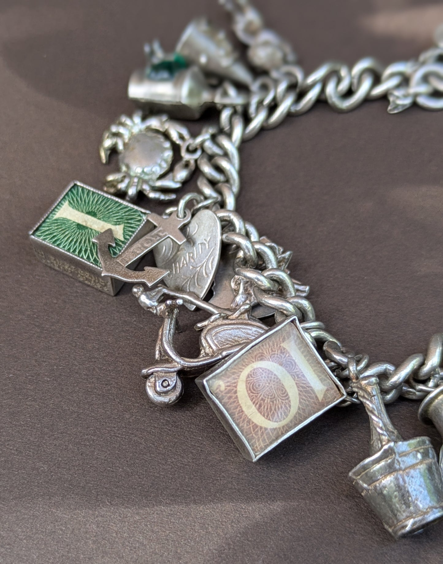 Elaborate English Sterling Charm Bracelet with Heart Clasp