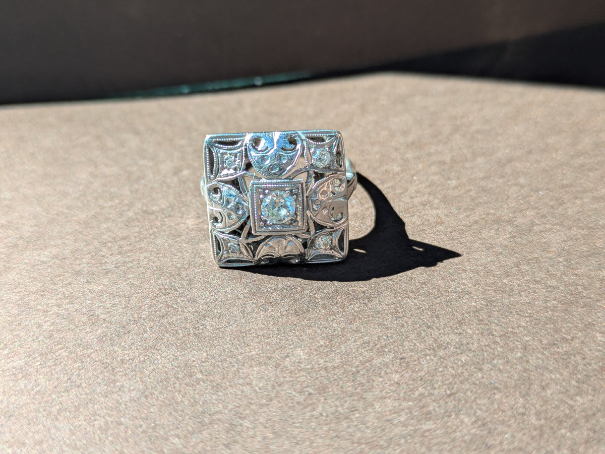 DIAMOND CENTERED FILGREE POSTAGE STAMP RING IN 14K WHITE GOLD