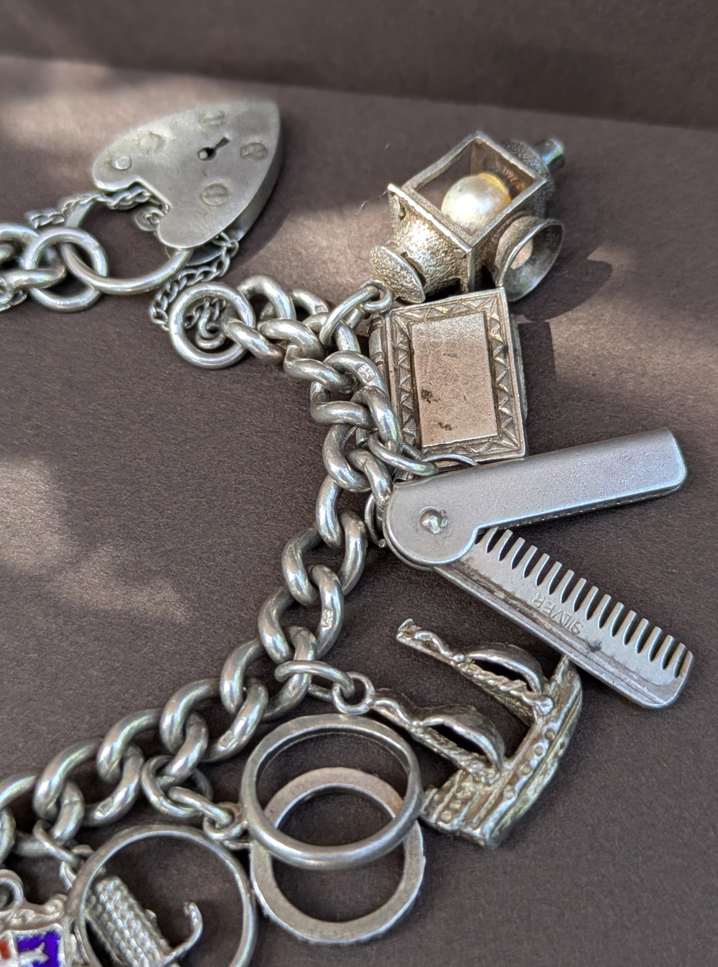 Elaborate English Sterling Charm Bracelet with Heart Clasp