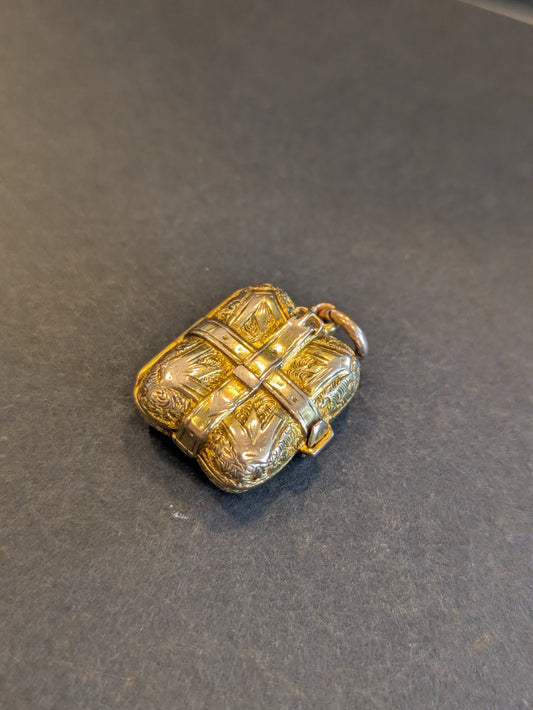 18k English Repousse Buckled Locket with hand chasing