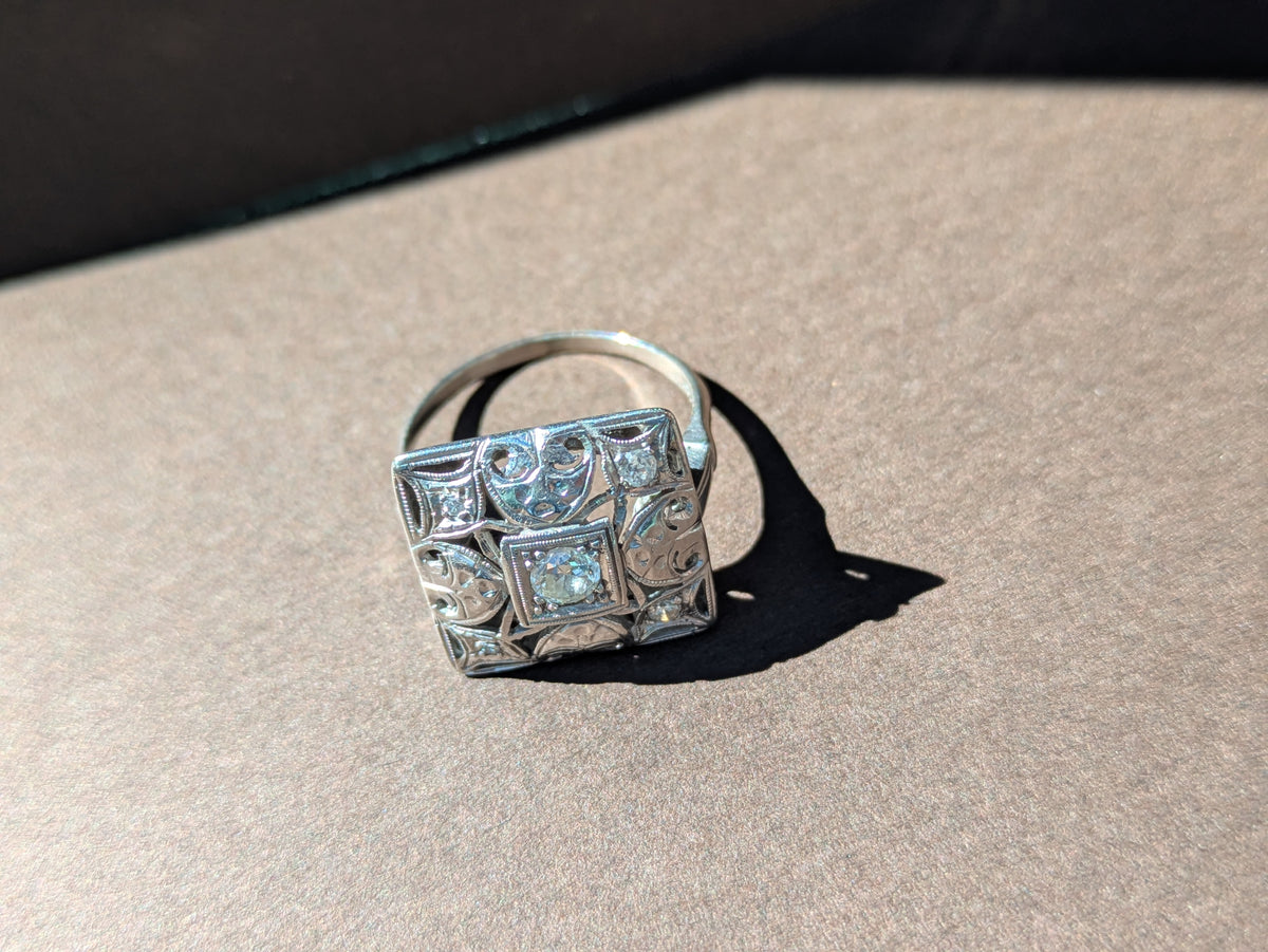 DIAMOND CENTERED FILGREE POSTAGE STAMP RING IN 14K WHITE GOLD