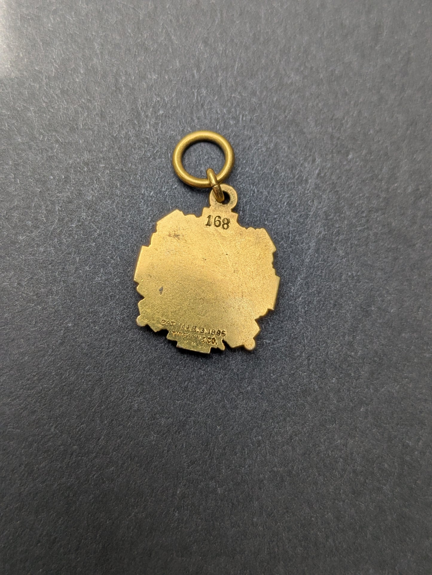 Tiffany + Co 1895 18k "7" Badge Charm