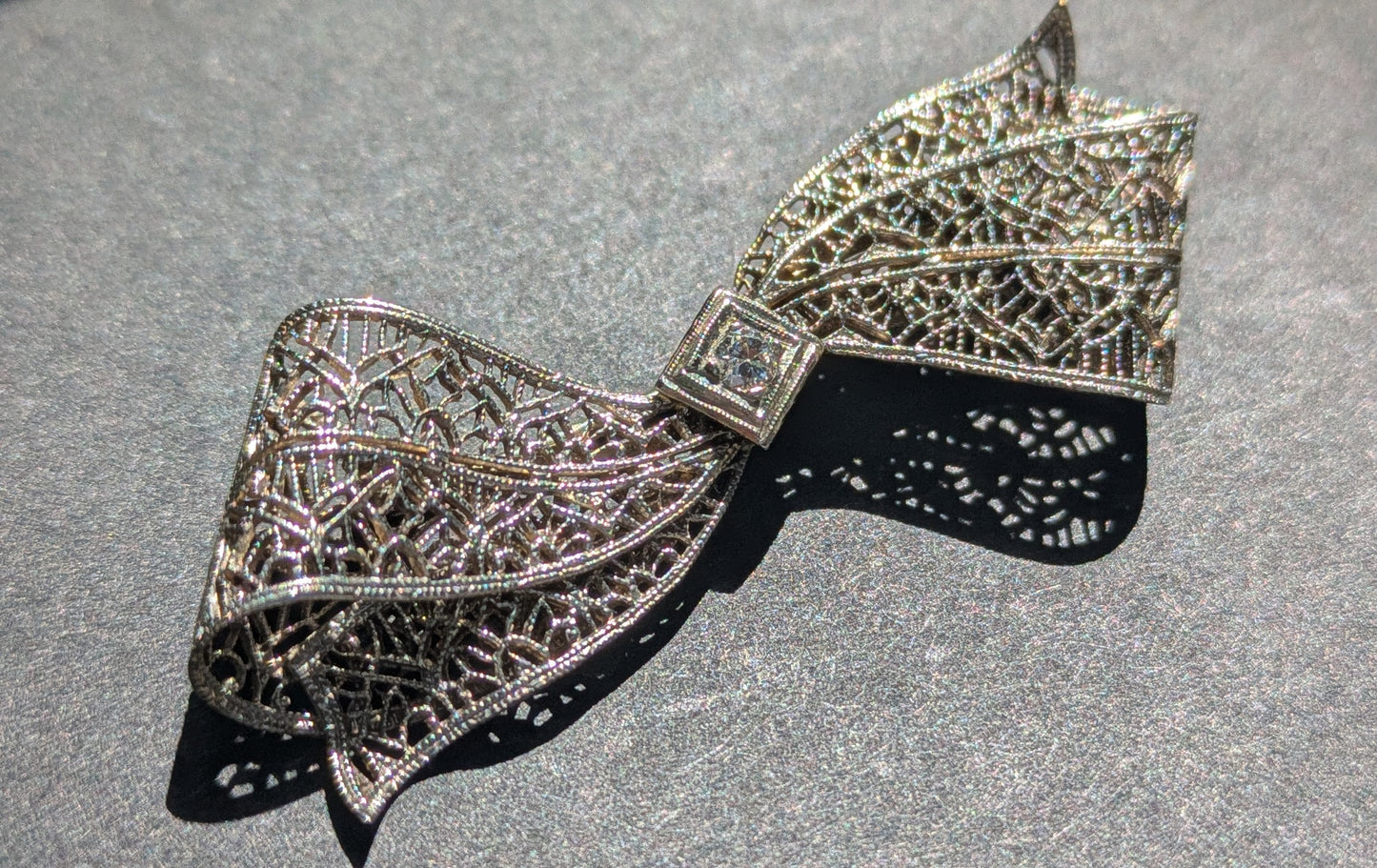 White Gold Filgree Bow Brooch with OEC Diamond
