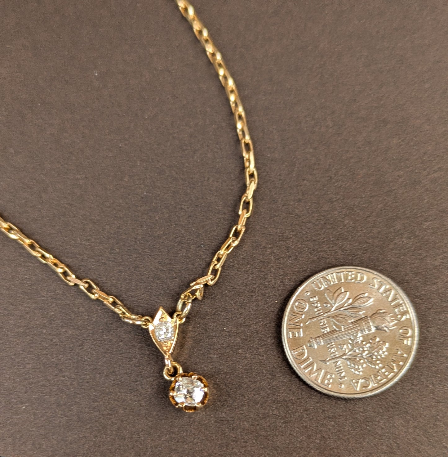 9kt Necklace with Sheild and Crown Set Mine Cut Diamonds