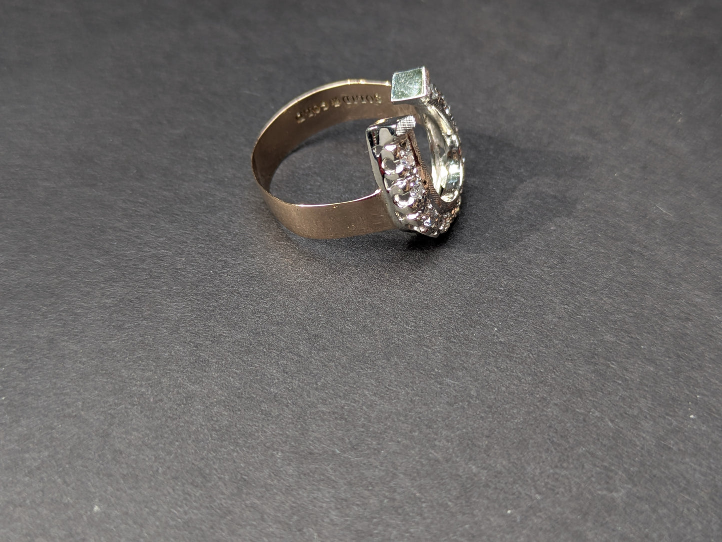 18kt White Gold and OEC Diamond Horseshoe on 14kt Band
