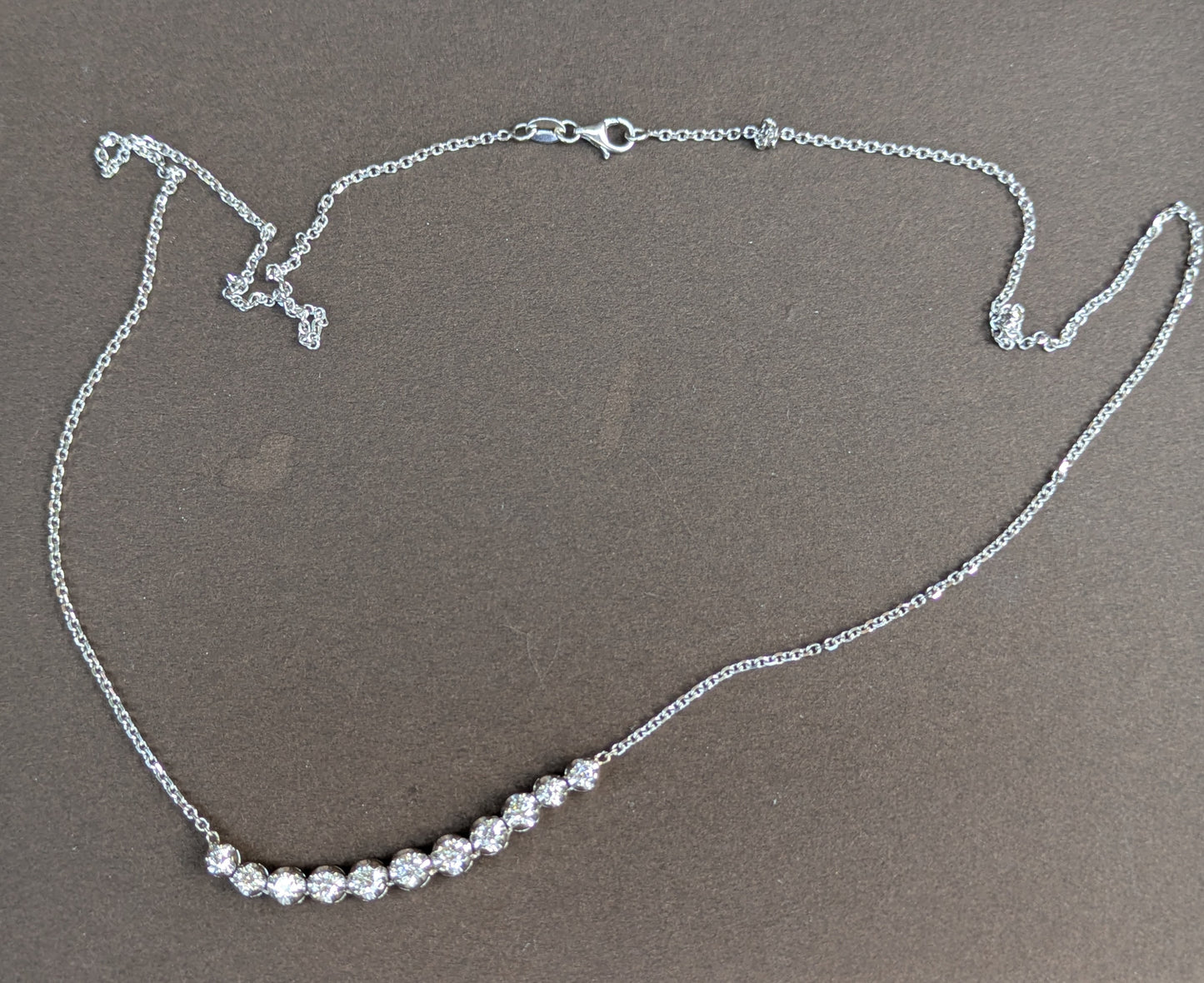 14kt White Gold Graduated Diamond Necklace- Crecent Style