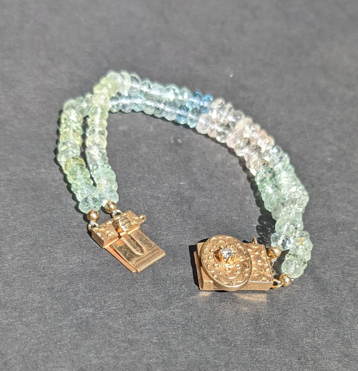 Two row aquamarine bracelet with antique 14kt clasp
