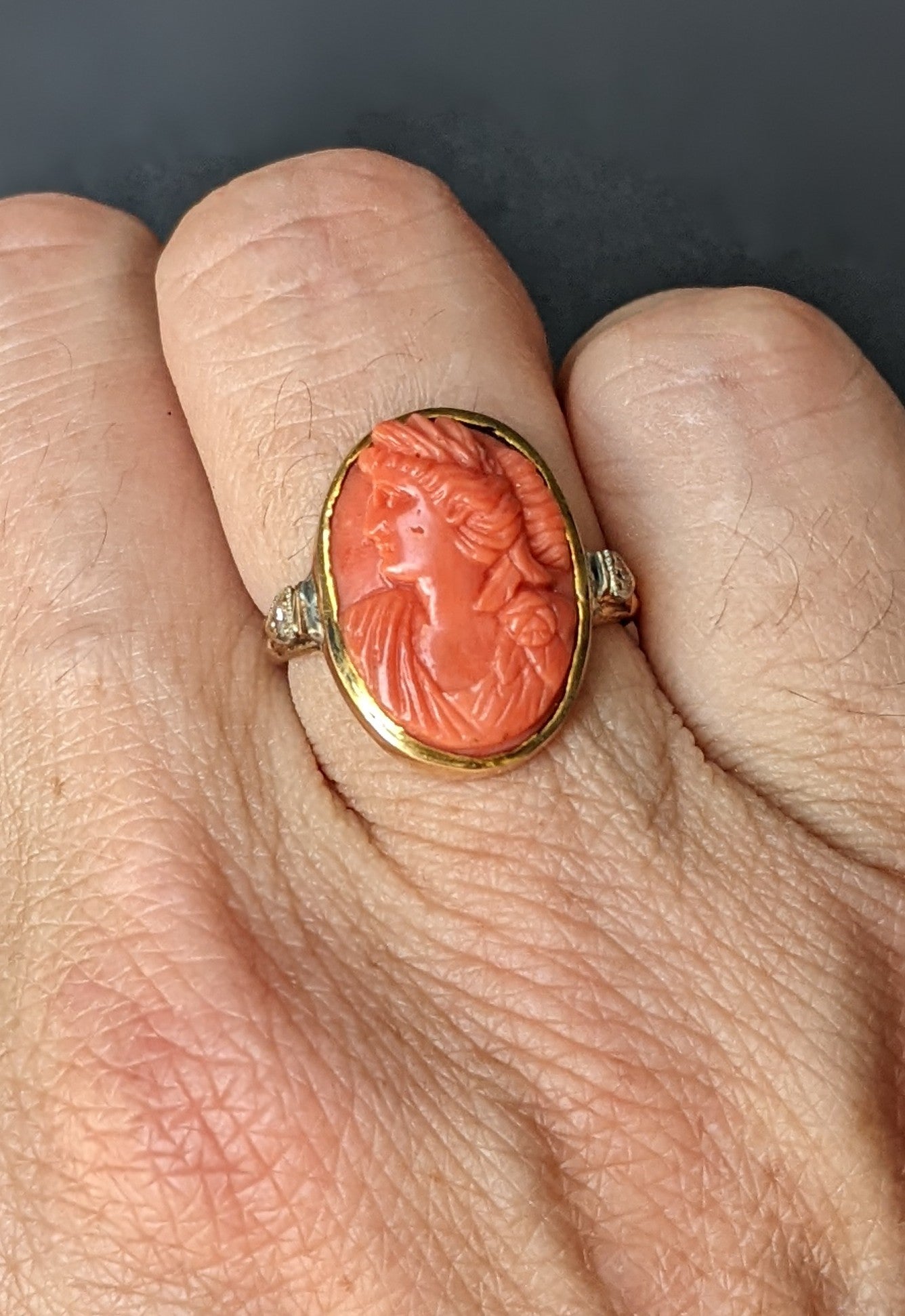 Coral cameo ring with diamond sides