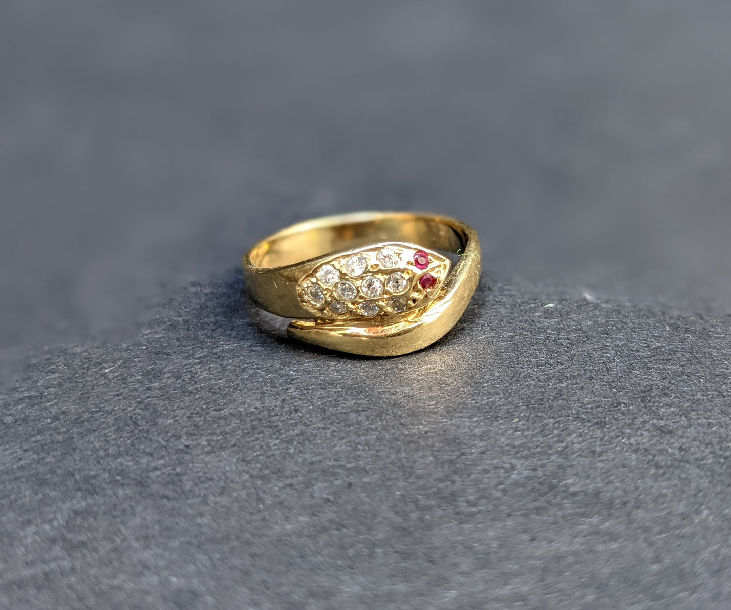 14k dutch snake ring with diamonds and ruby