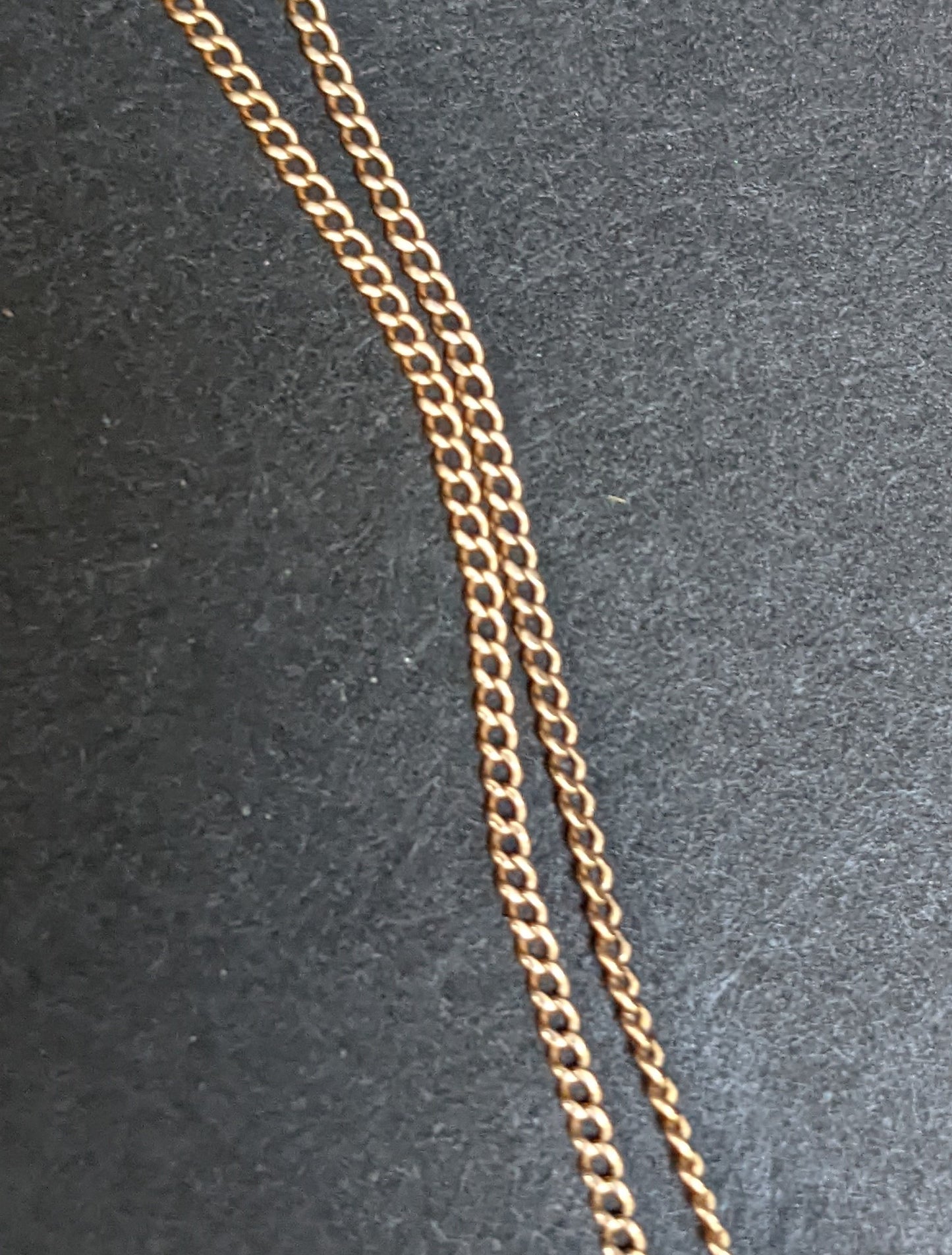 Late Victorian 14K yellow gold carved black onyx watch fob on 9ct chain