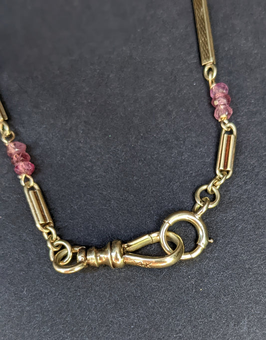 Yellow gold watch chain with pink sapphire additions