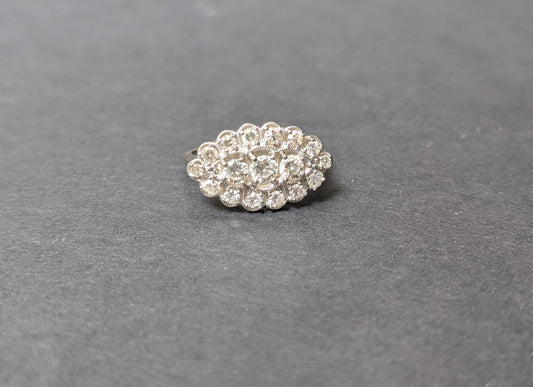Vintage diamond cluster ring with milgrain