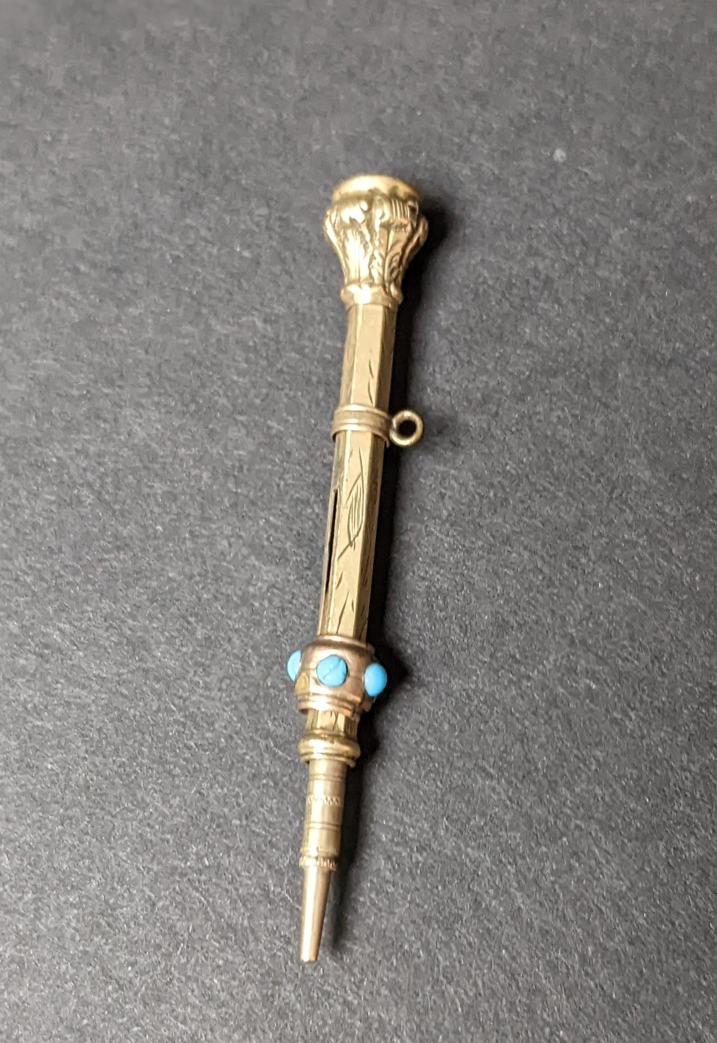 9k Victorian propelling pencil with turquoise and garnet