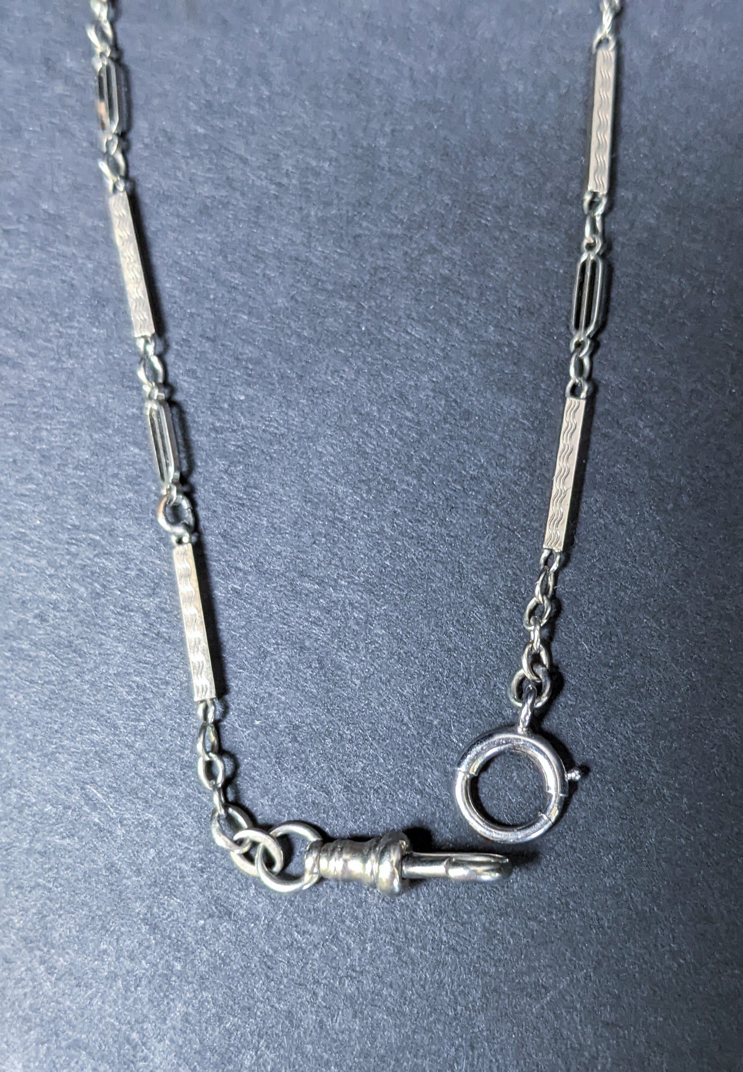 White gold watch chain with dog clip and large c clasp