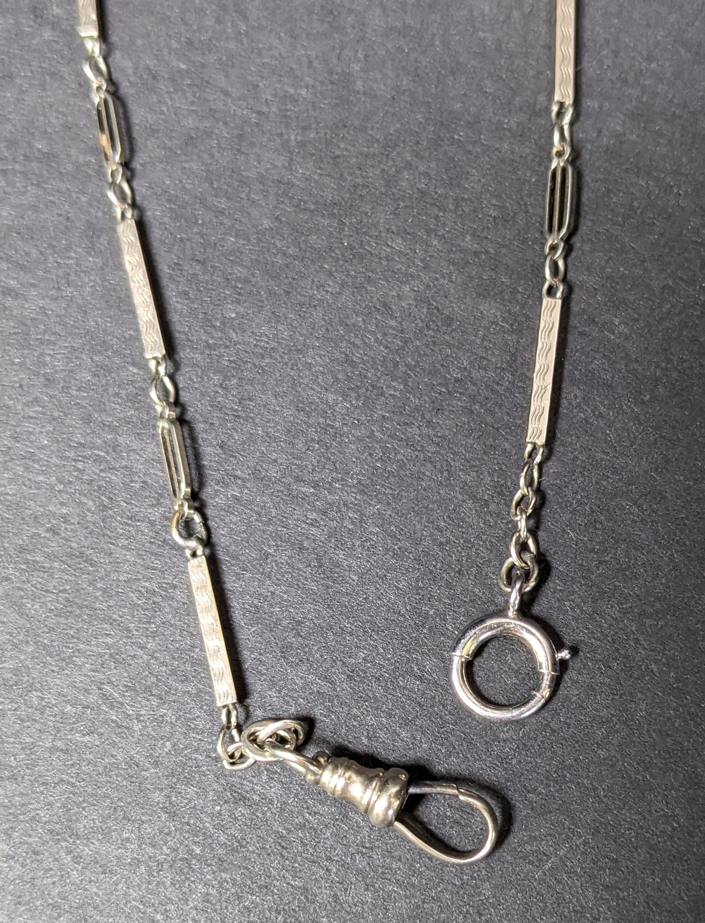 White gold watch chain with dog clip and large c clasp