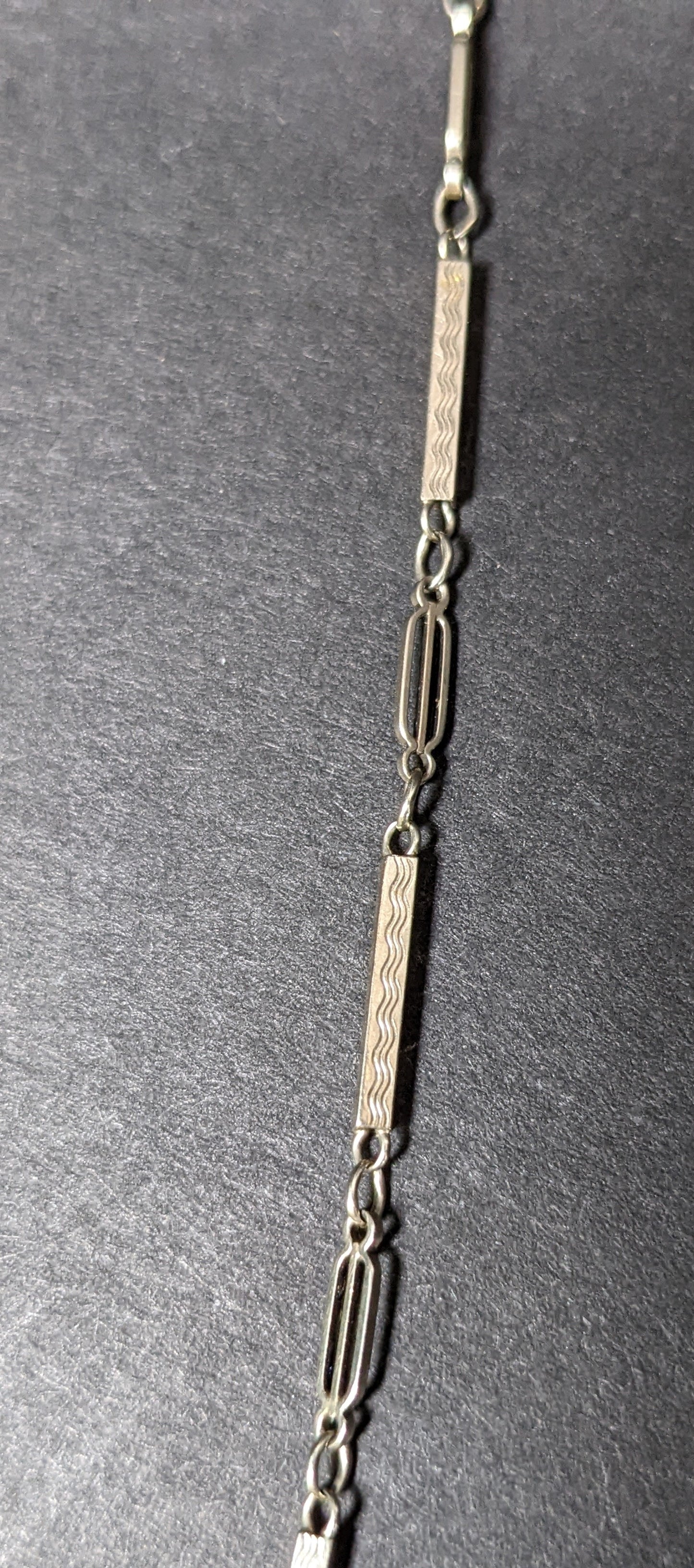 White gold watch chain with dog clip and large c clasp