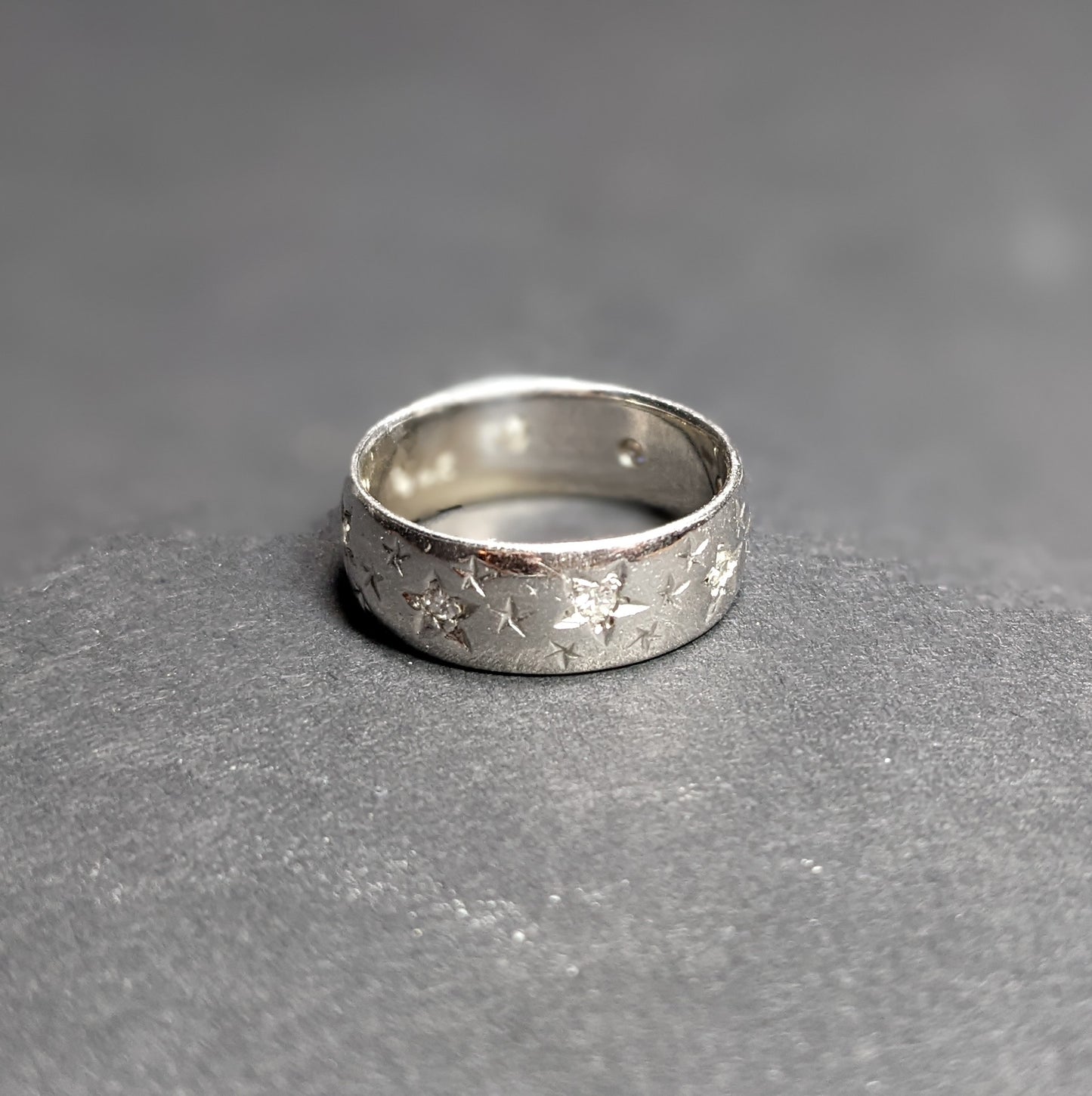 14kt Wide white gold band set with stars and diamonds