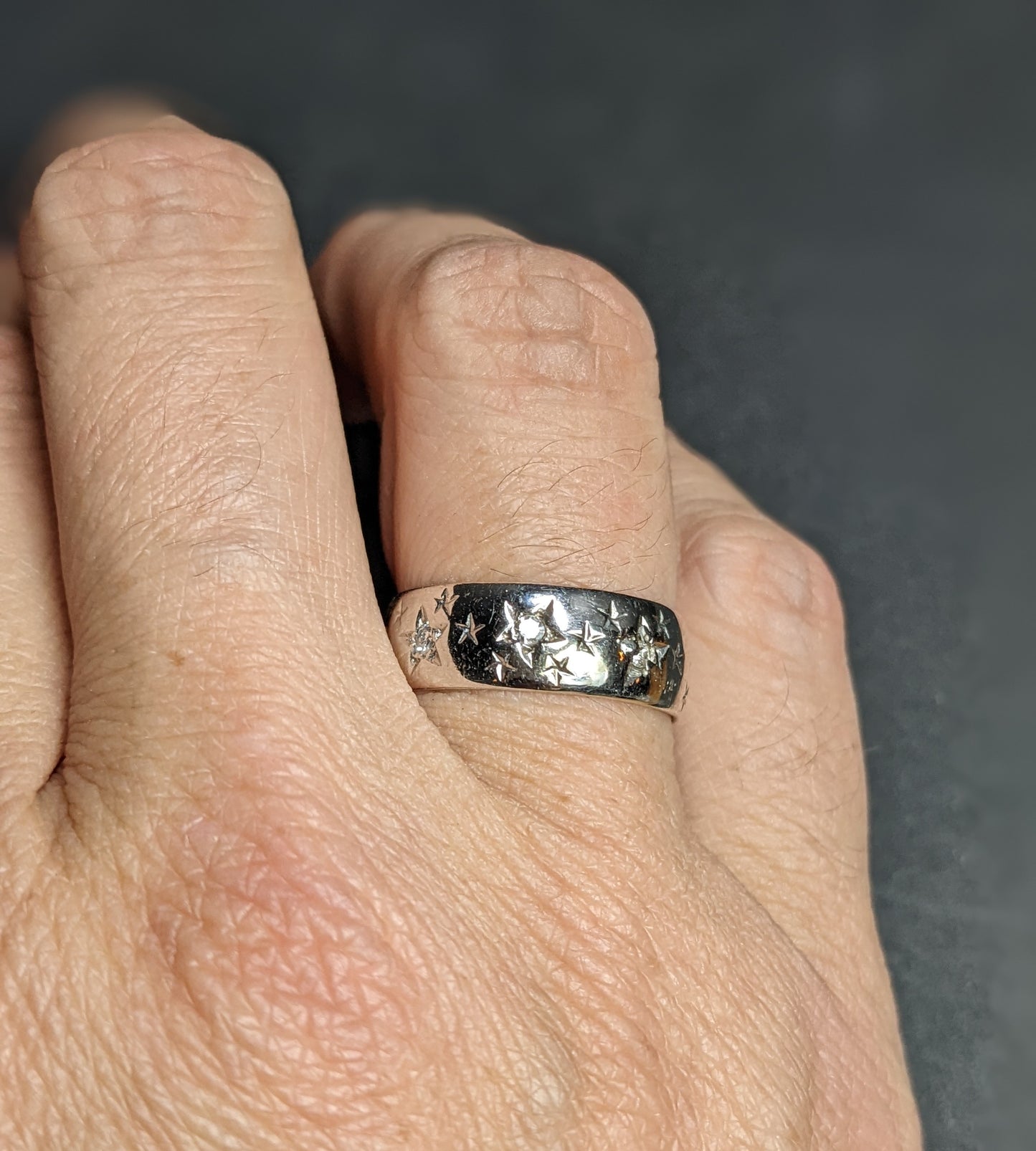 14kt Wide white gold band set with stars and diamonds