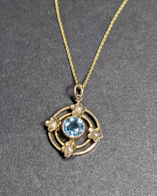 14kt chain with 14kt conversion blue zircon and half pearl pendant