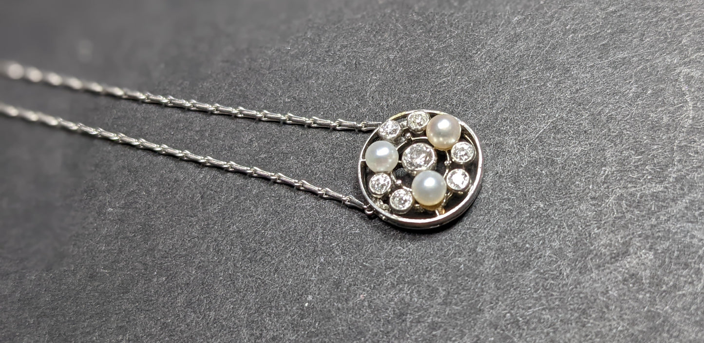 Diamond and pearl circle necklace