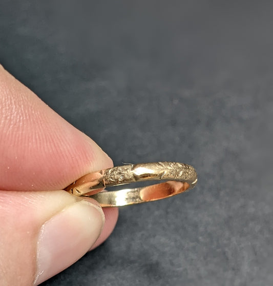 14k yellow gold wedding band with floral engraving