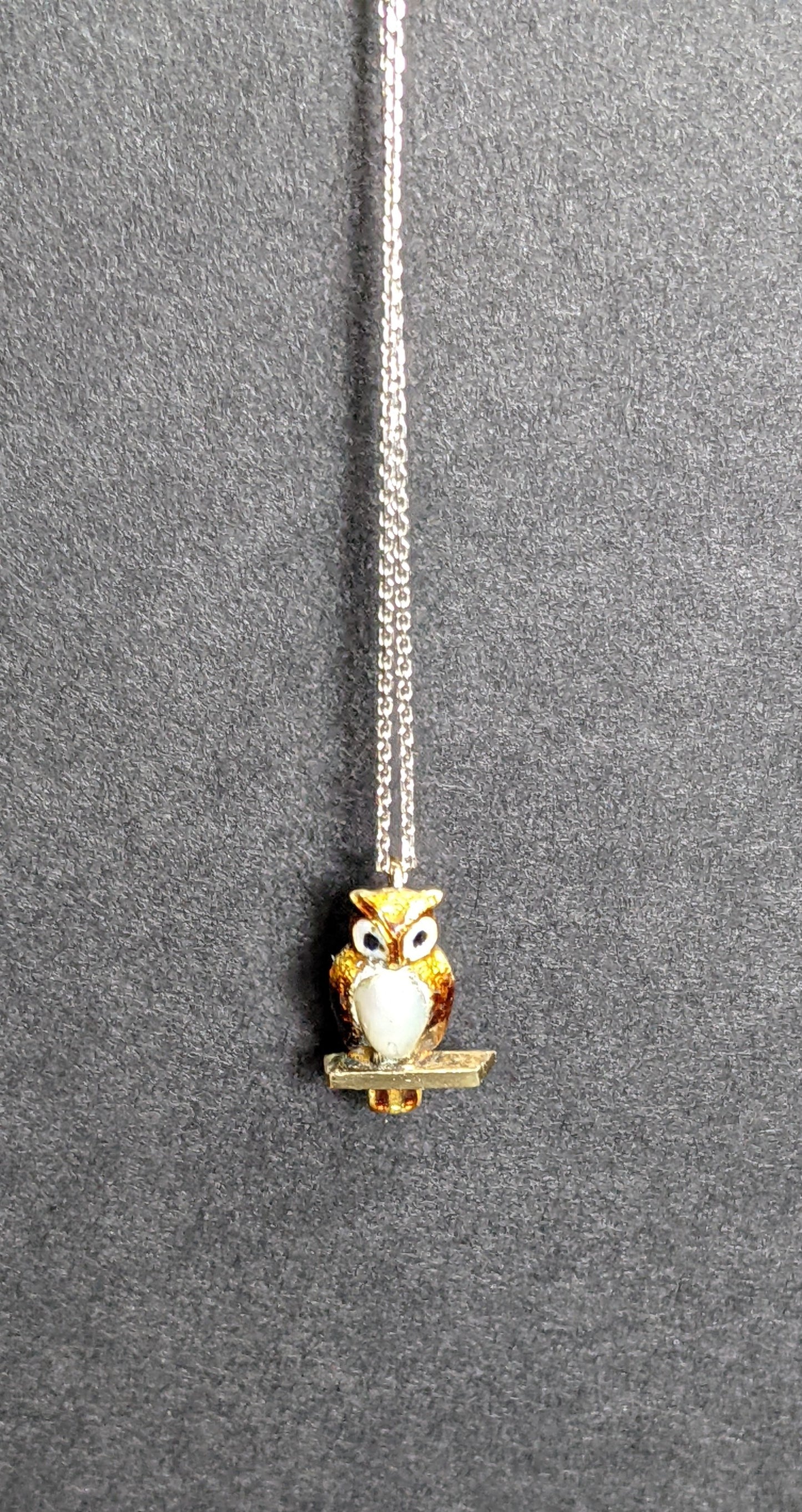 Exquisite pearl and enamel owl pendant on white gold chain