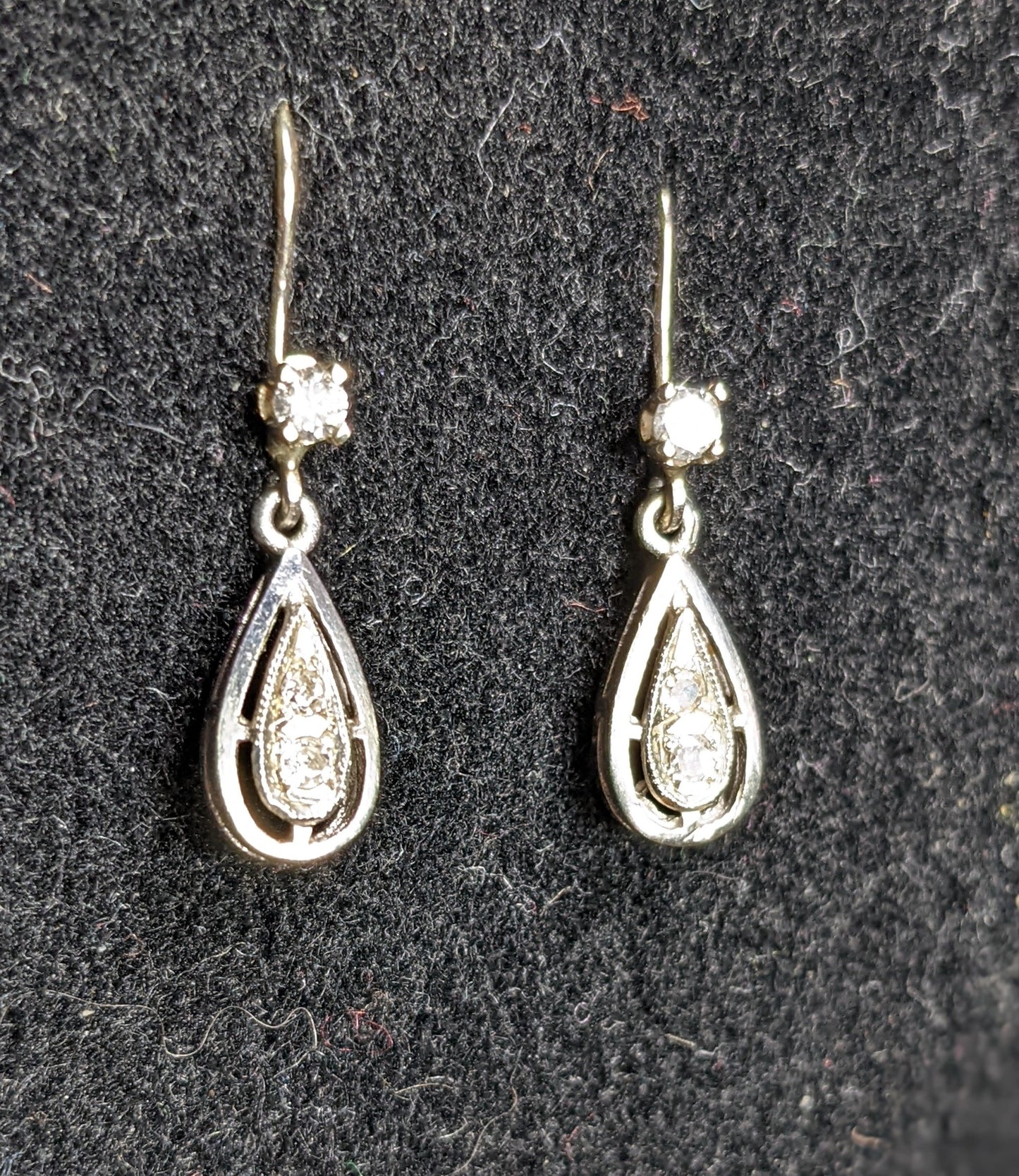Tear drop diamond earrings on diamond leverbacks