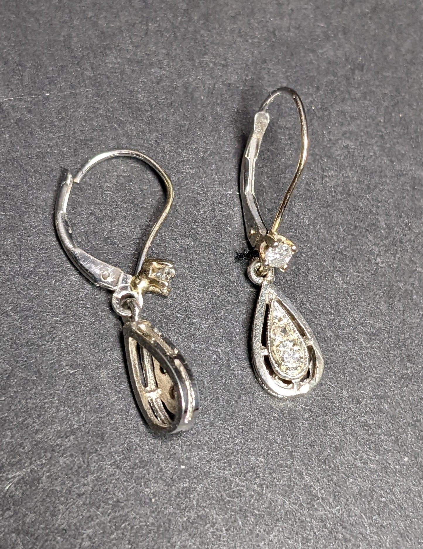 Tear drop diamond earrings on diamond leverbacks