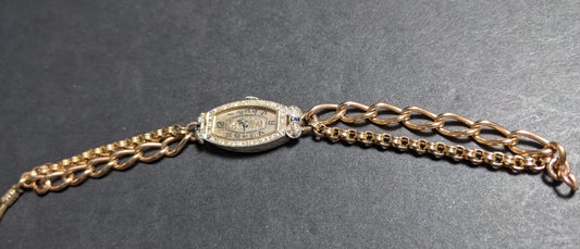 Antique platinum watch with watch chain bracelet