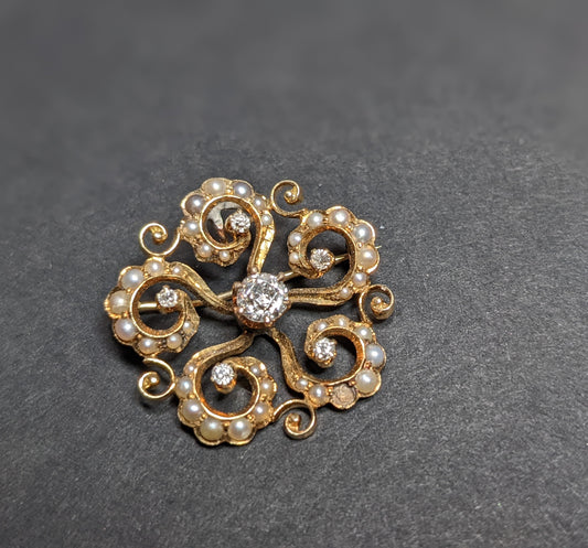 Victorian era 14k Starburst with Seed Pearls and Mine Cut Diamond