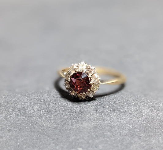 18k Garnet and mine cut diamond halo ring