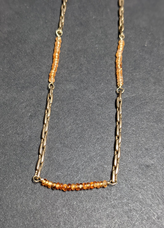 14k Gold watch chain with large bolt clasp and orange sapphire additions