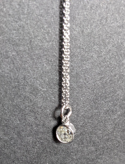 Old European cut diamond in original bezel on 14k white gold chain