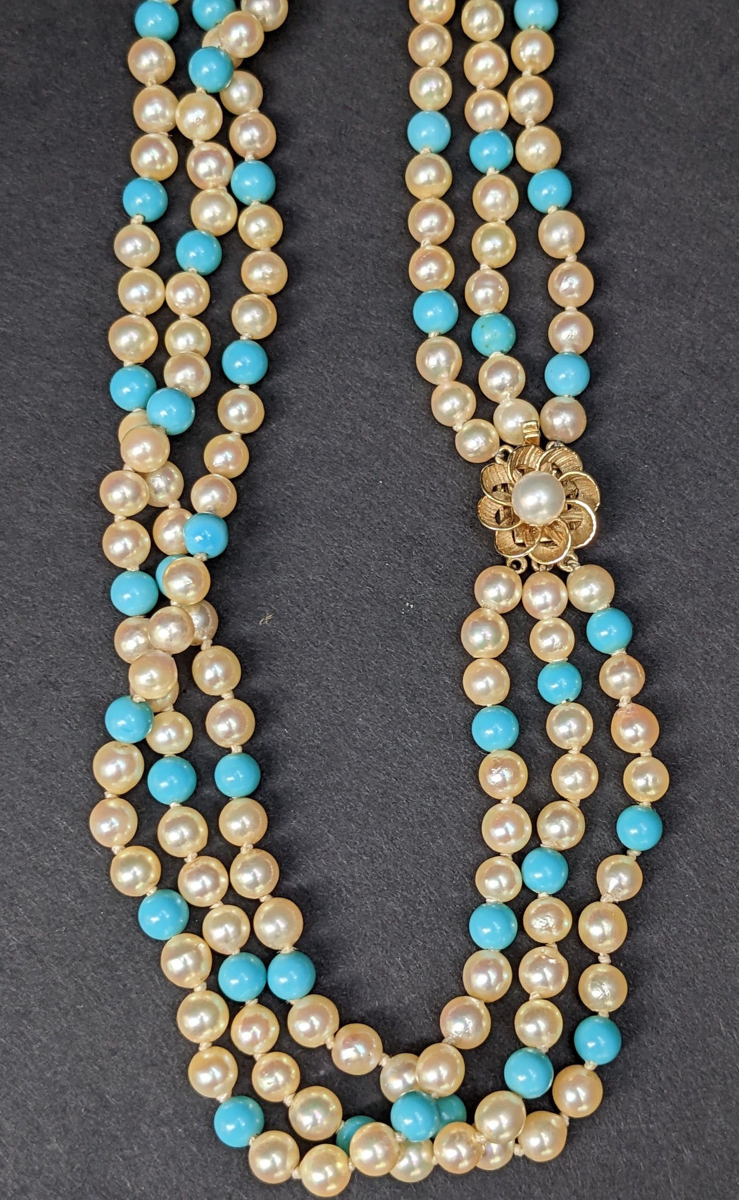 Multi strand pearl and turquoise necklace with 14k floral clasp