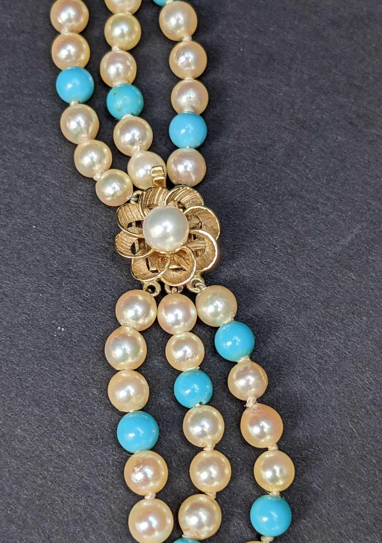 Multi strand pearl and turquoise necklace with 14k floral clasp
