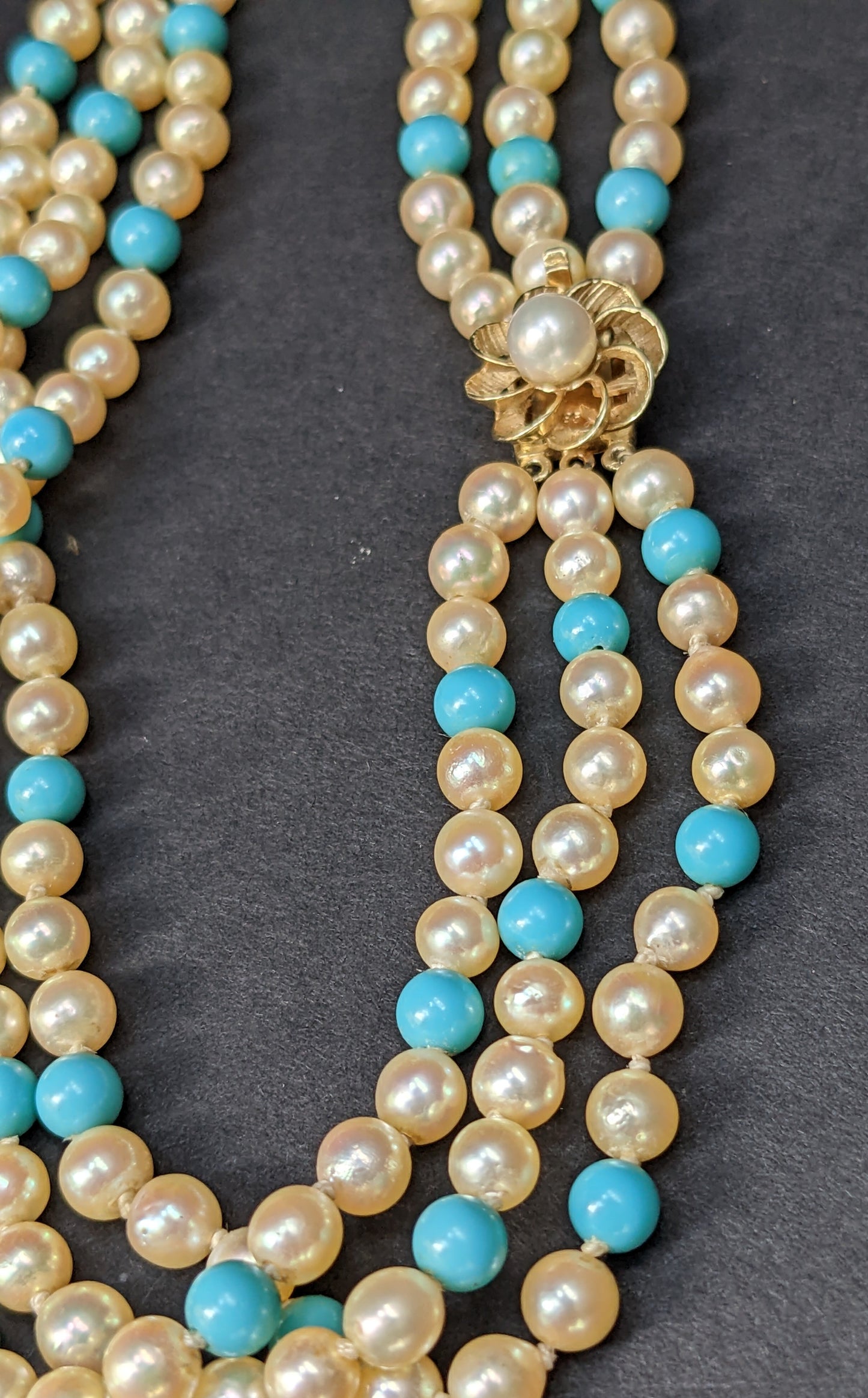 Multi strand pearl and turquoise necklace with 14k floral clasp