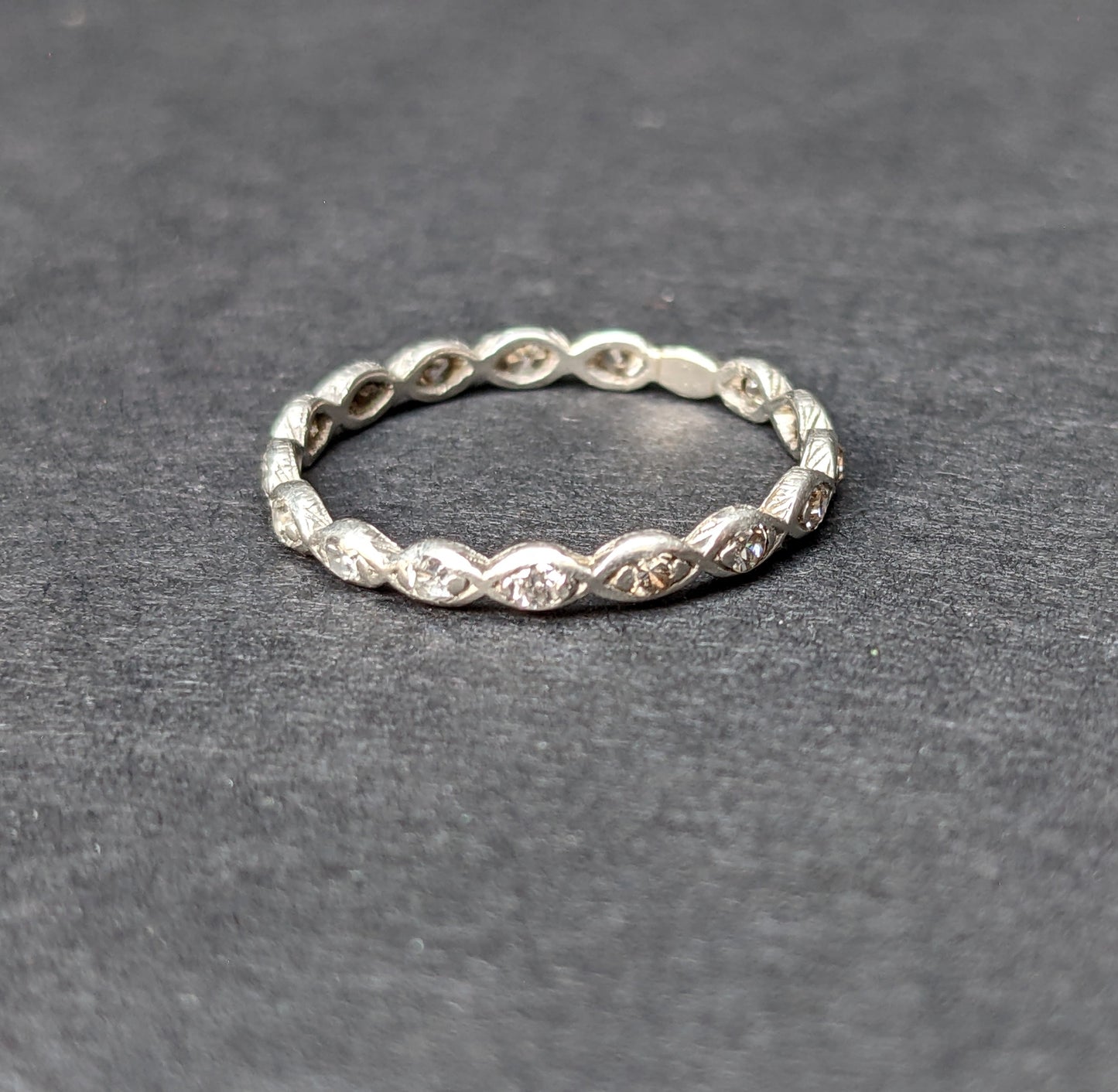 Platinum and diamond scallop band