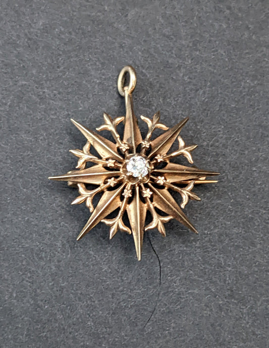 14k Diamond starburst pin/ pendant.
