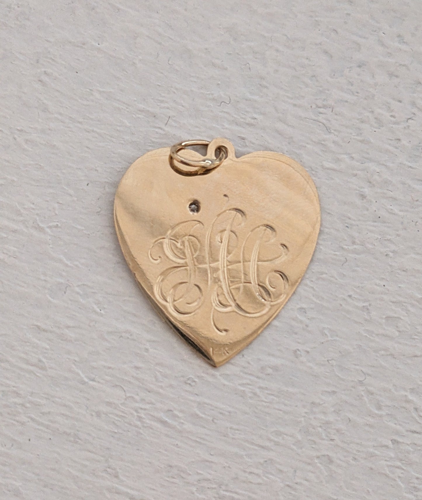 1960s 14k gold heart charm with diamond