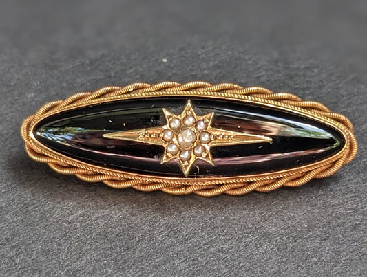 Long Oval 12Kt Onyx Mourning Brooch with Braid and Seed Pearl Starburst